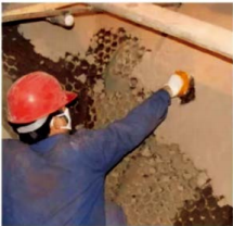 Wear resistant spray coating for flue